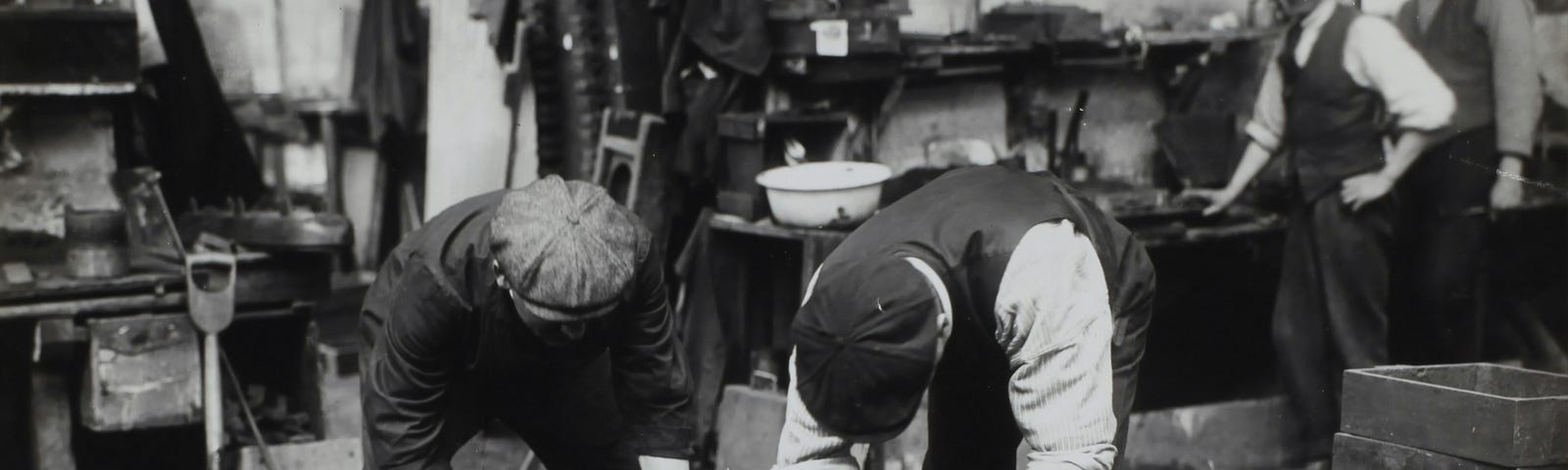 Black and White image of factory workers