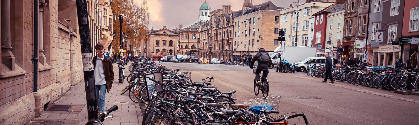 A city street in Oxford, England, showing bicycles, and pedestrians-a view representative of life as a traveler without an iPhone.