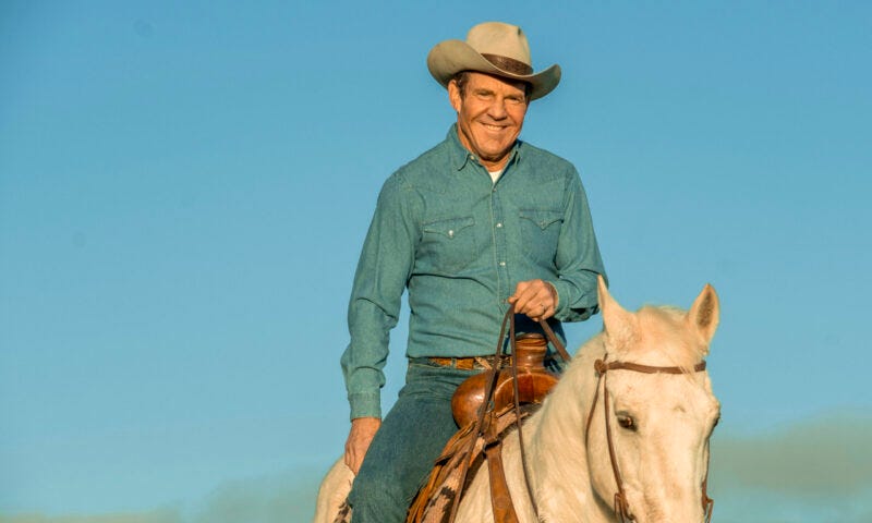 Dennis Quaid on horseback as Reagan