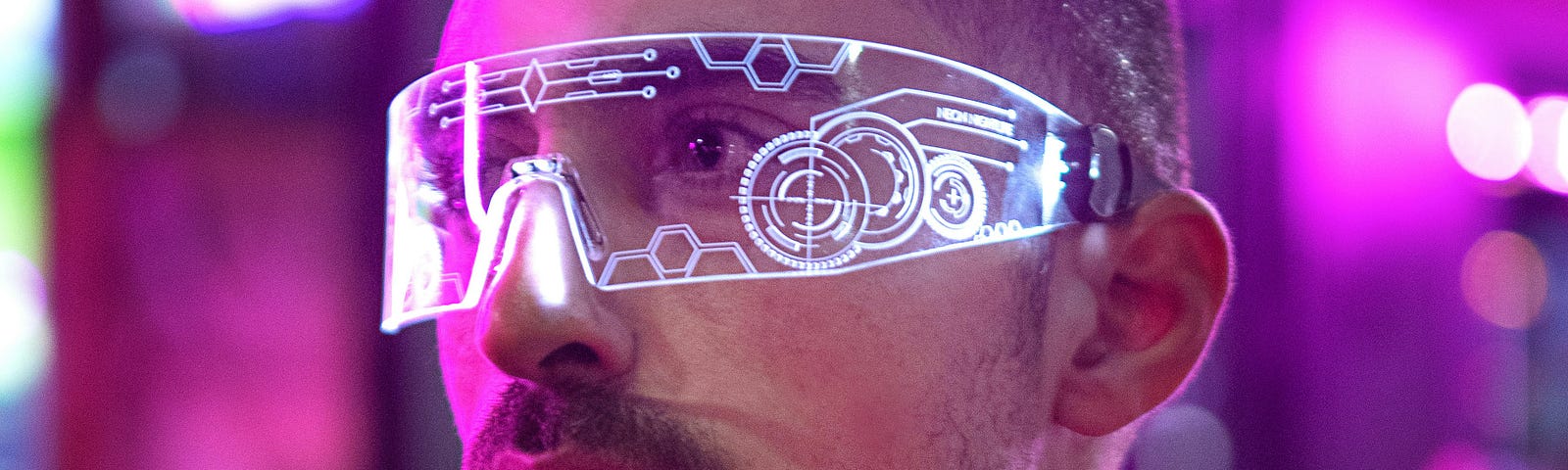 Man with computerised spectacles.