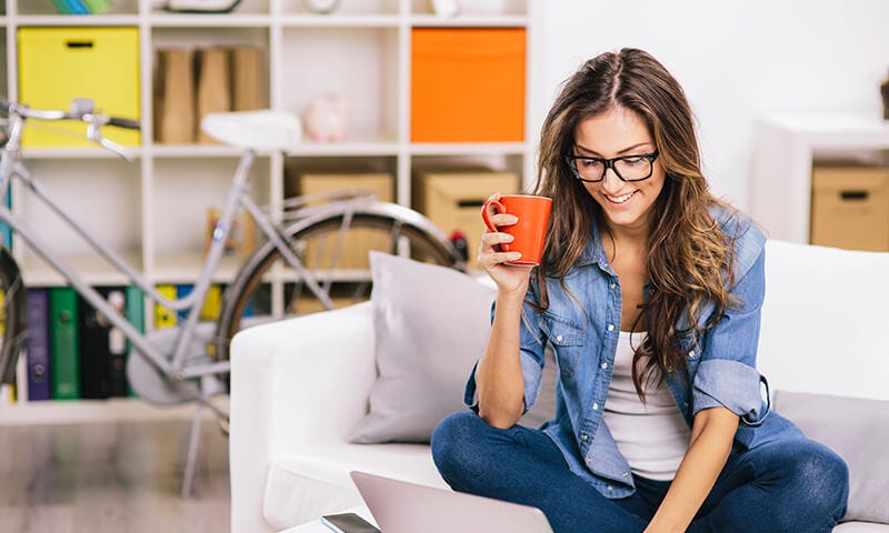 Woman on laptop doing tutoring