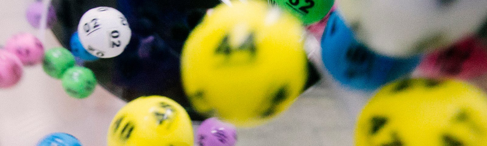 Colorful floating lottery balls before the winners drop