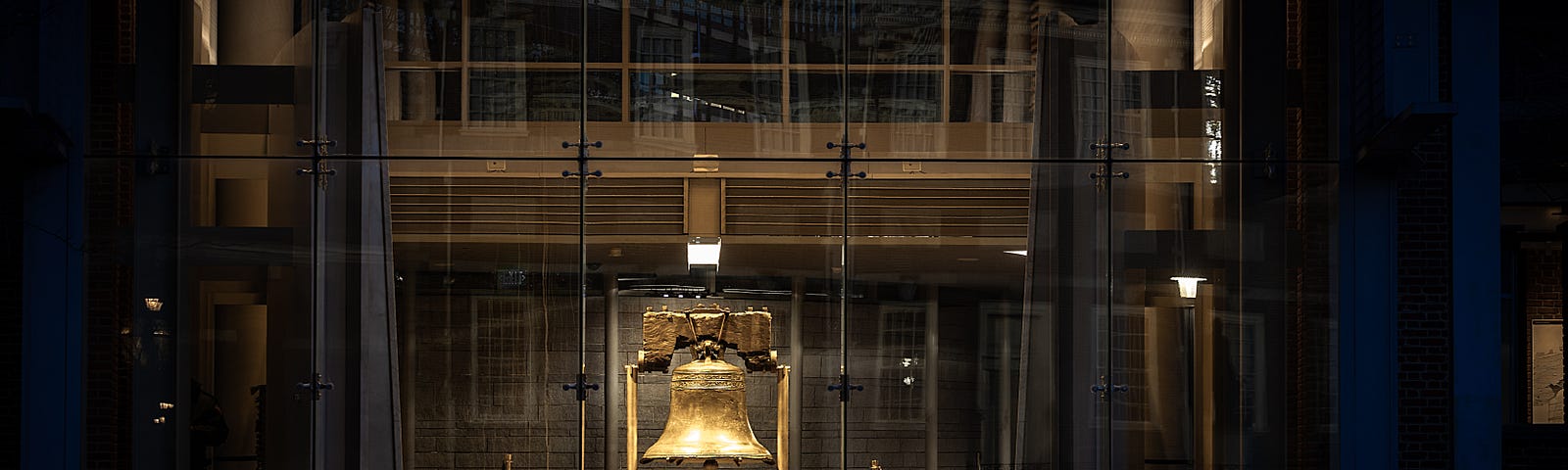 The Liberty Bell lit up at night.