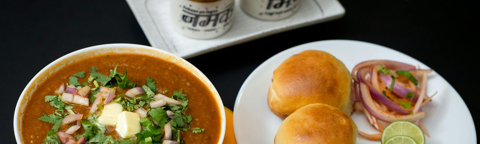 Pav Bhaaji, a vegetable side dish with bread buns.