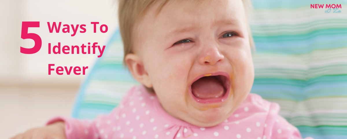 Baby in pink, crying. 5 ways to identify fever.