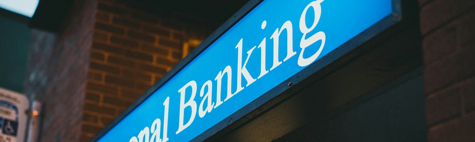 a neon sign saying Personal Banking