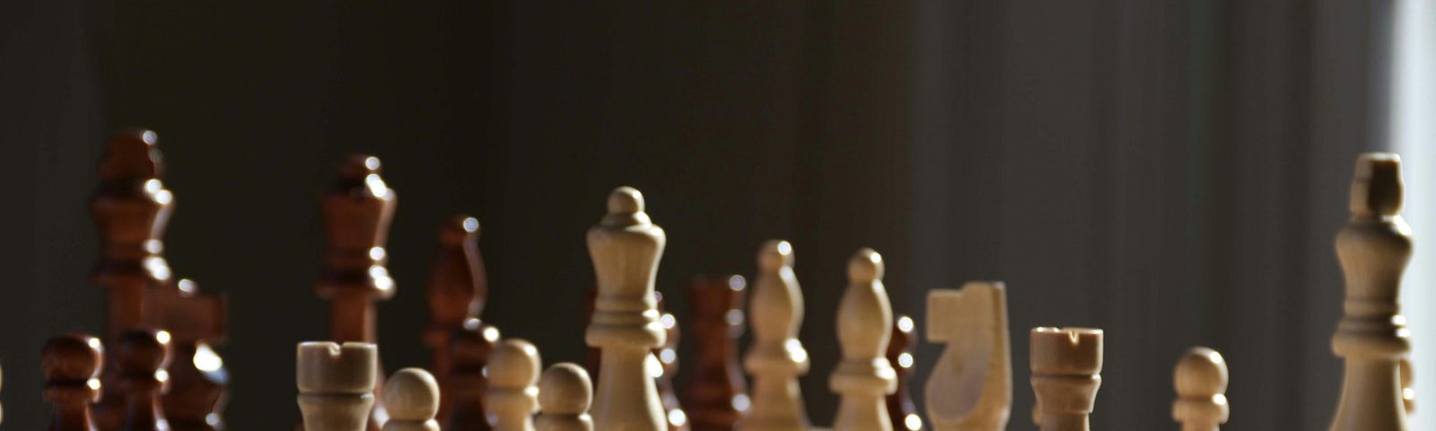 a game of chess with the pieces set up on a board
