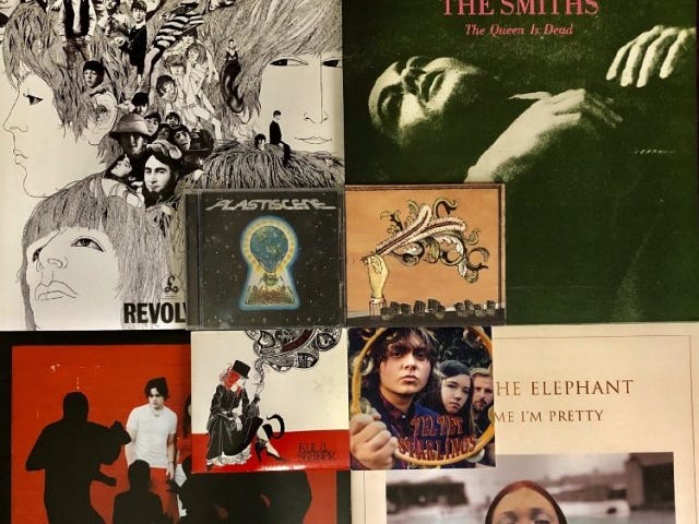 Four vinyl sleeves sorted in a 2 by 2 square with anoth 2 by 2 square of CDS in the center; vinyl top left to bottom right: The Beatles’ “Revolver,” The Smiths’ “The Queen is Dead,” The White Stripes’ “White Blood Cells,” Cage the Elephant’s “Tell Me I’m Pretty” — CDs top left to bottom right: Plastiscene’s “Seeing Stars,” Arcade Fire’s “Funeral,” Kula Shaker’s “Strangefolk,” Velvet Starling’s self-titled EP