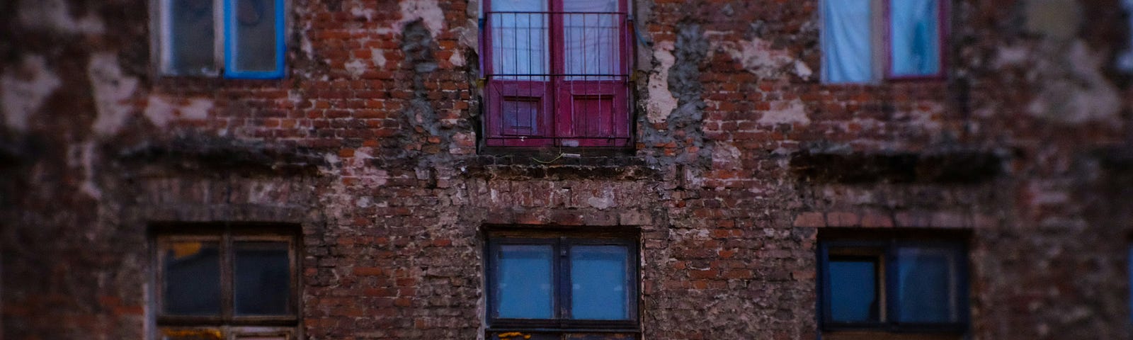 A brick exterior of apartments