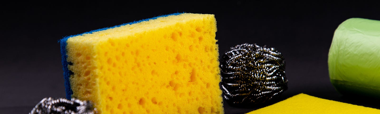 A sponge and other cleaning supplies.