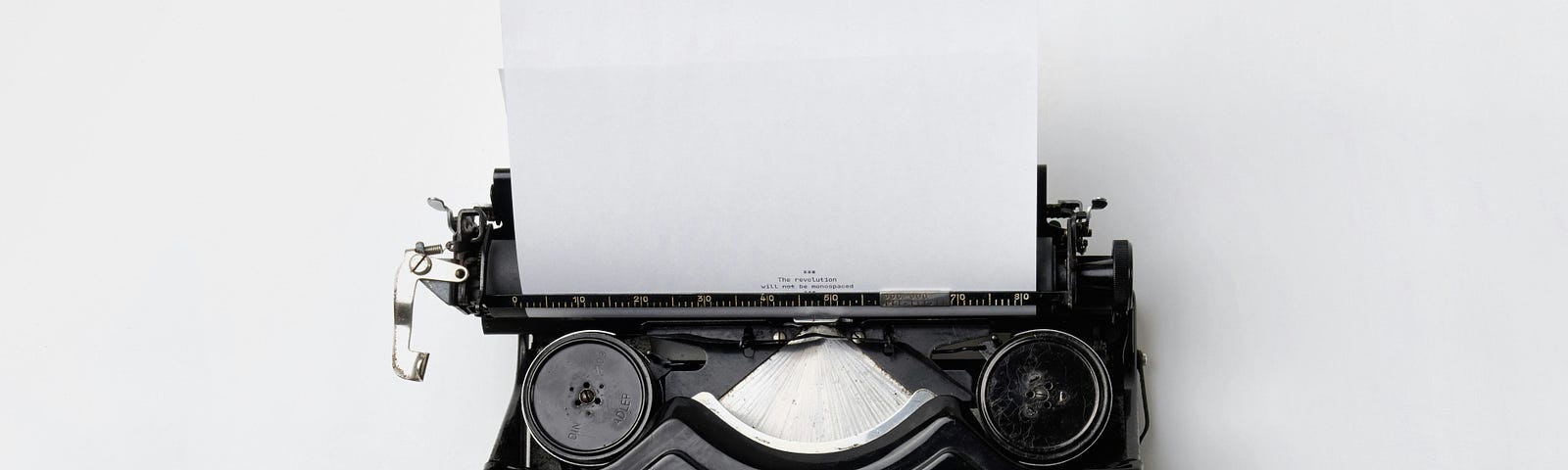 typewriter with a blank page