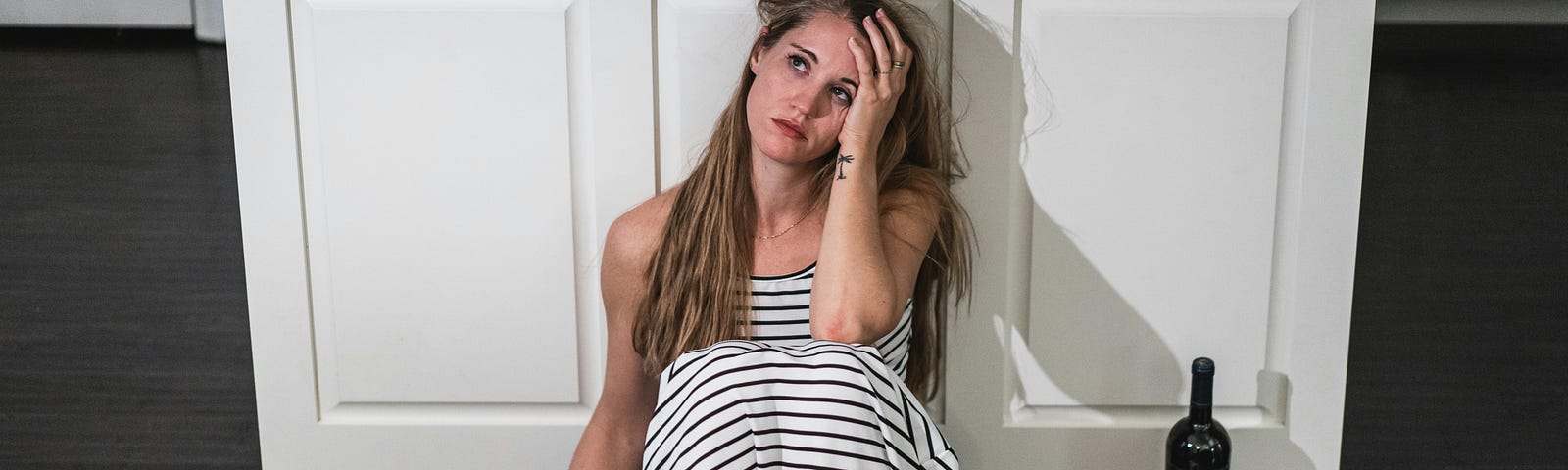 Stressed out young small business owner and online marketing shows dark side of success