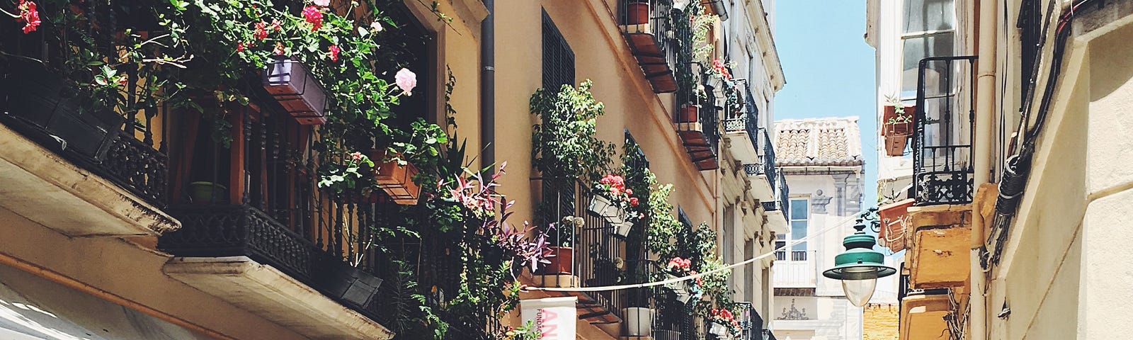 A pastel-colored Mediterranean alleyway