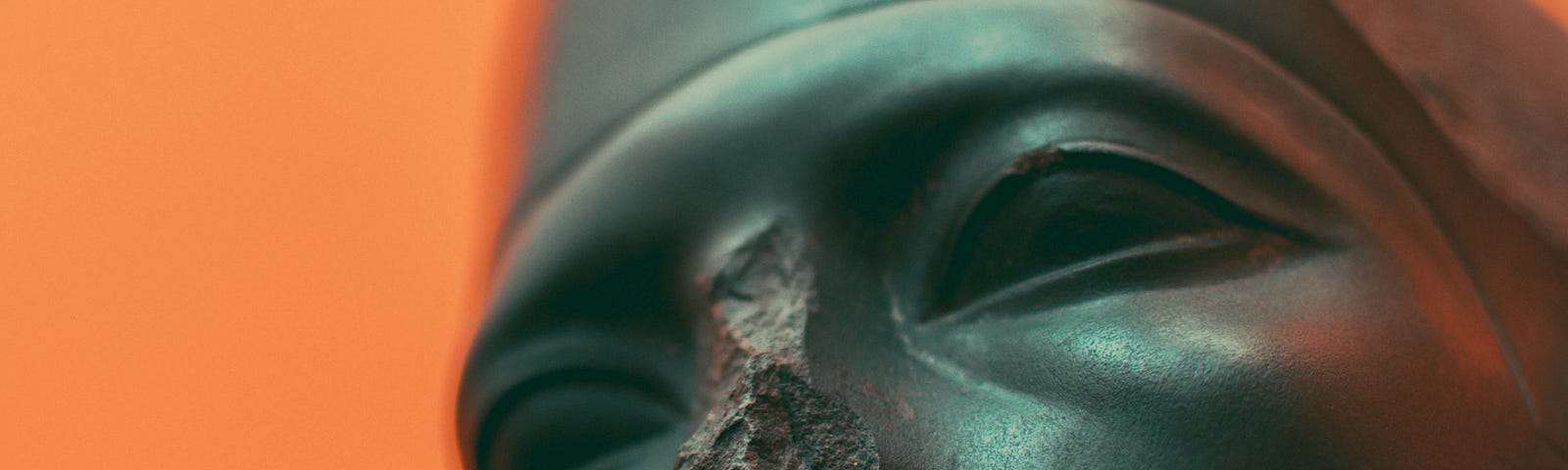 An ancient black statue of a person’s face, the nose having fallen off. Inhaling menthol improves cognitive function in animal models of Alzheimer’s dementia.