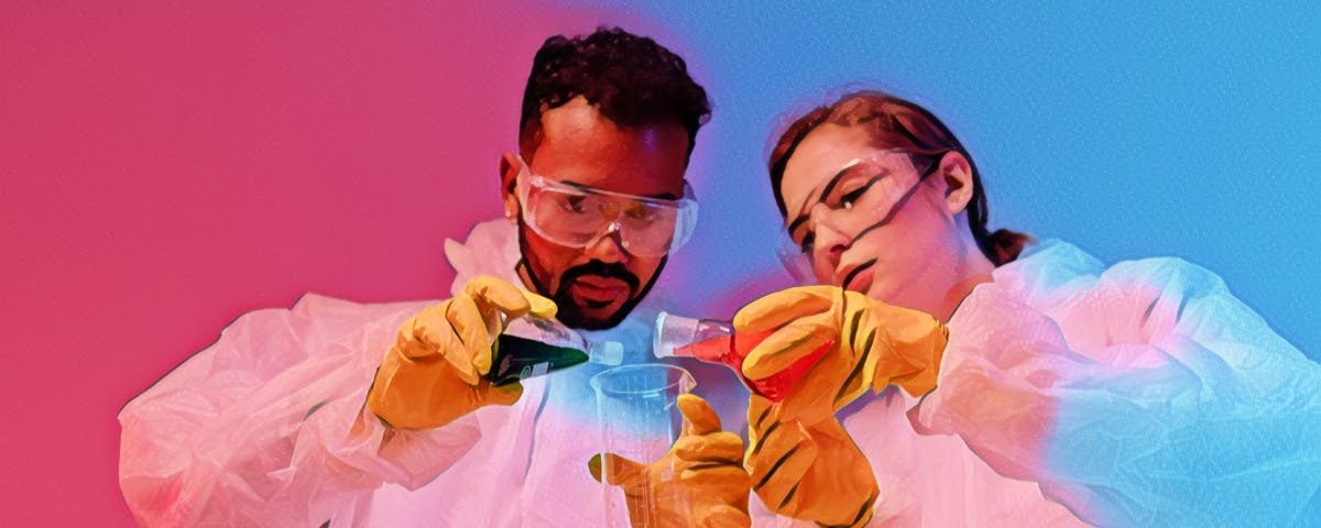 Two chemists working with beakers