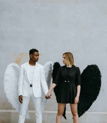 Interracial couple with angel wings