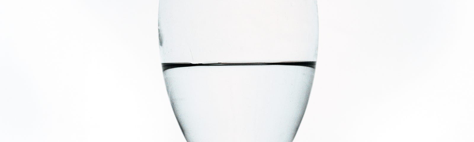 glass half empty, photo of a glass, a monoku