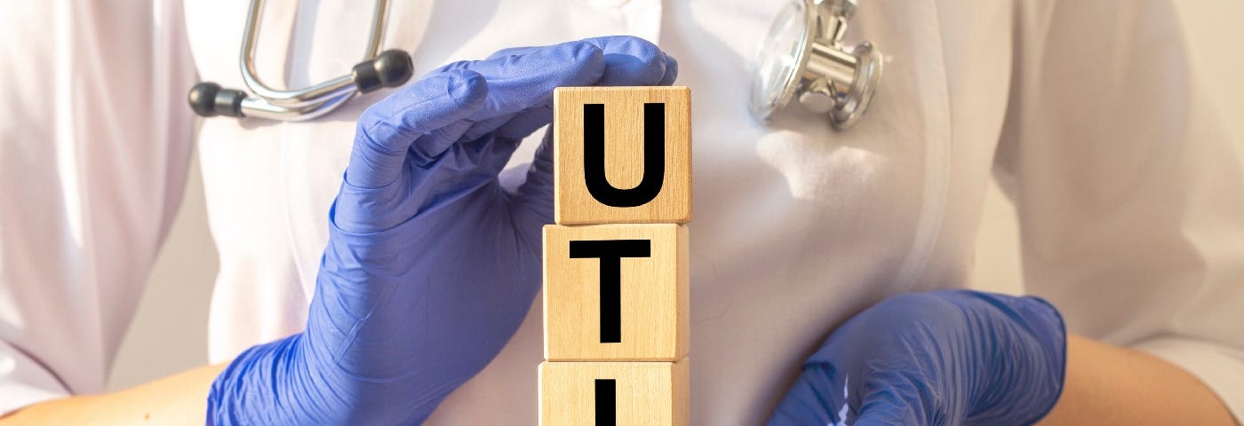 Doctor identifying urinary tract infection (UTI) symptoms and prevention strategies