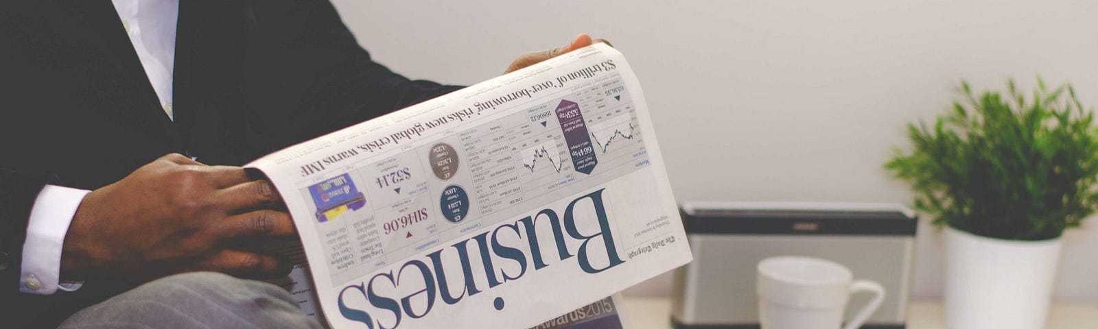 Reading a Newspaper; Best Ways Small Businesses Can Tap Fintech Opportunities