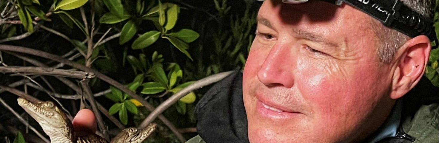 Jeff Corwin with baby alligator