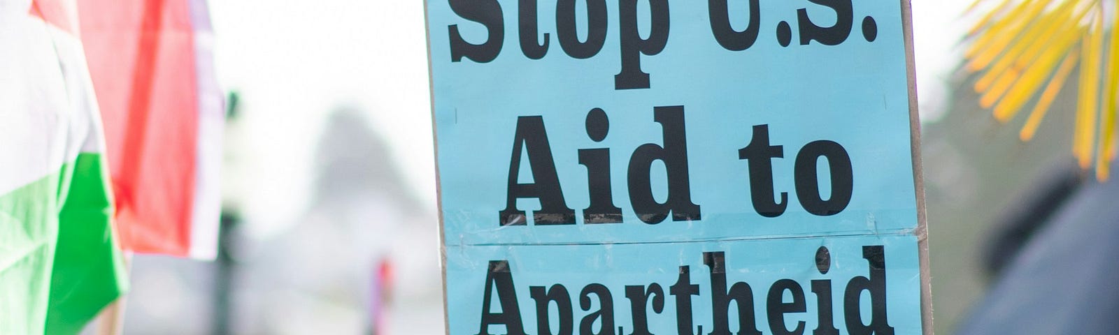 Protest sign “Stop U.S. Aid the Apartheid Israel