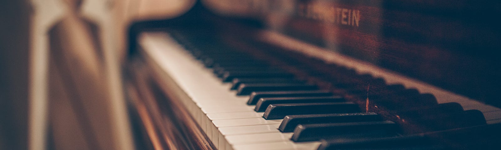 A brown upright piano.