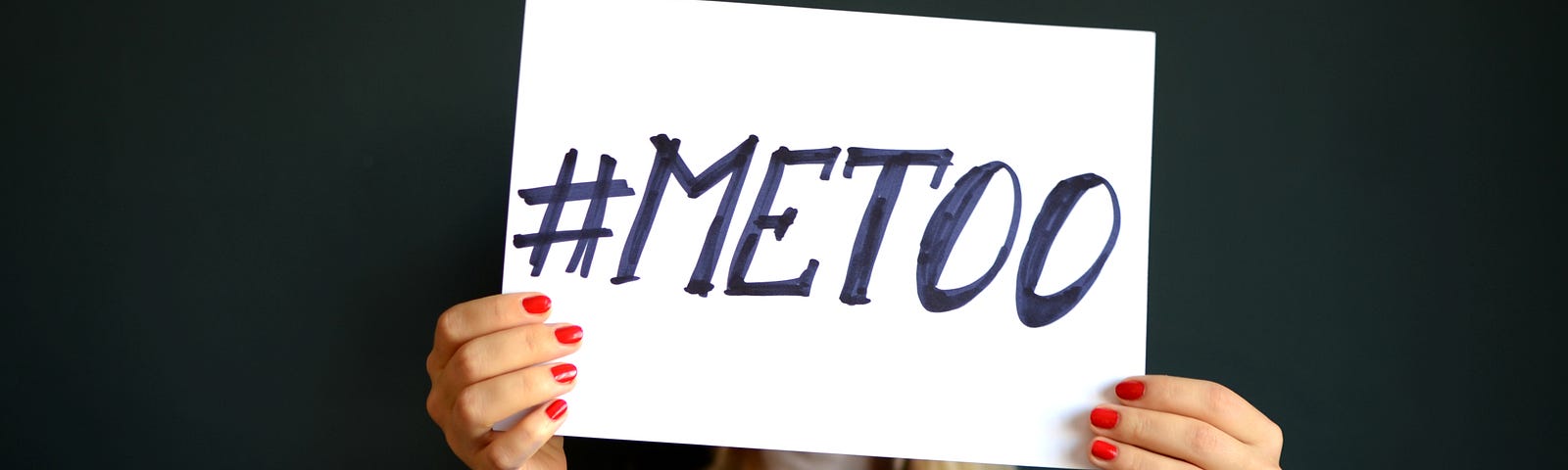 No means no. Woman holding a #metoo sign