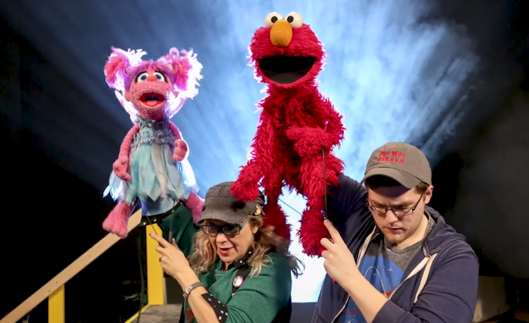 Photo of Sesame Street puppets and puppeteers on PBS TV Show for children. Satire. Humor. Funny. Entertainment. Education.