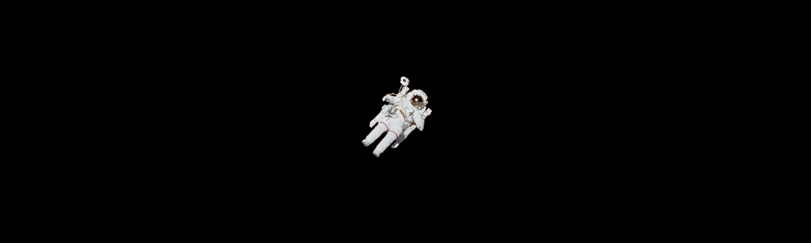 An astronaut on a spacewalk above the Earth’s surface