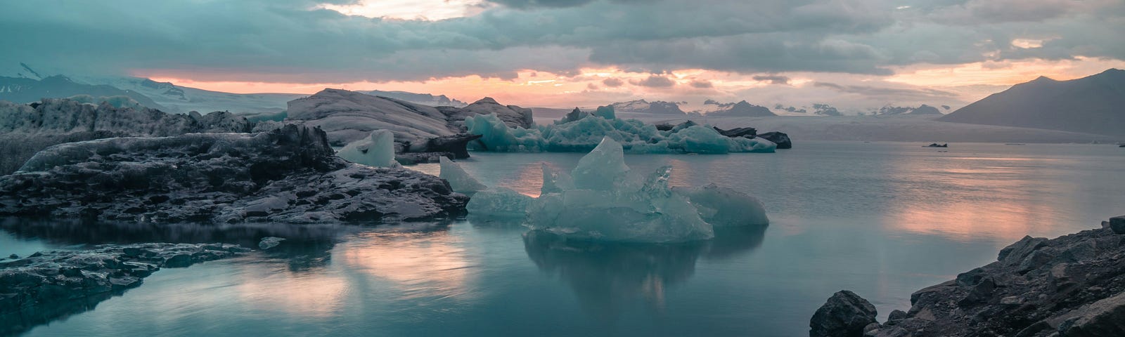 Iceberds and ice over a coastal landscape