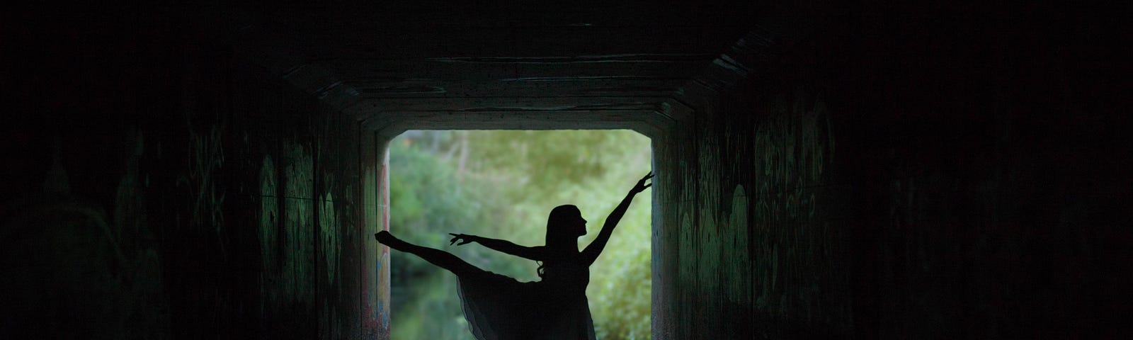 A woman doing ballet in a storm drain — she seems nice.