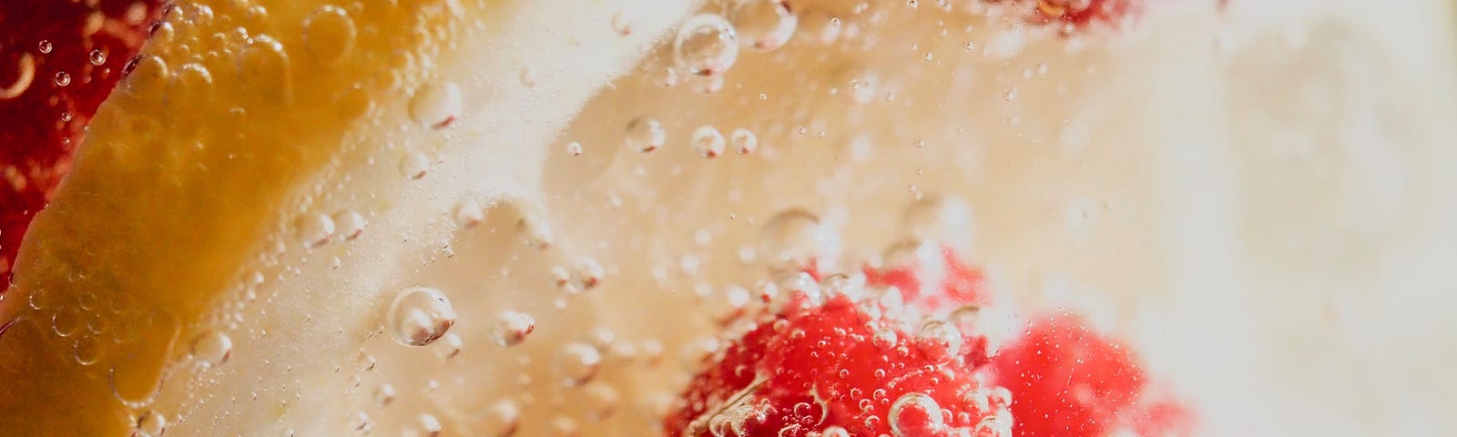 A raspberry bloats in sparkling water. Some call it “seltzer water,” while others prefer “carbonated water.” The beverage’s gas can be natural, or manufacturers may infuse it into still water. In some forms, sparkling water is a healthy alternative to soda.