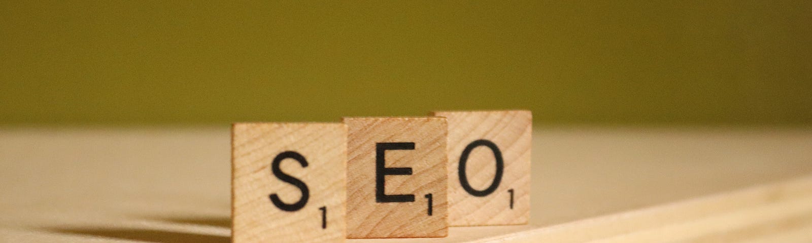 Scrabble pieces spell “SEO”