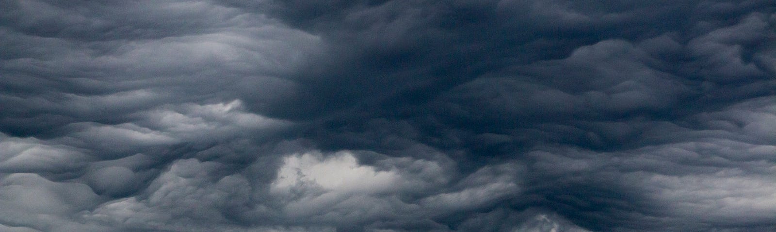 A brooding, grey, cloudy sky