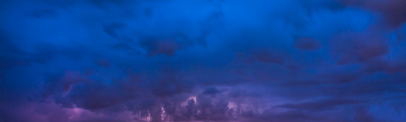 Photo of thunderstorm over the ocean