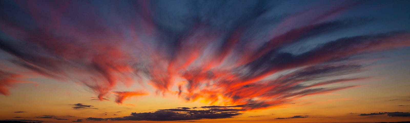 dawn clouds over the ocean