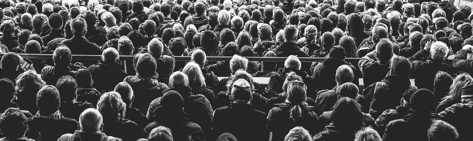 Audience photo in black and white.