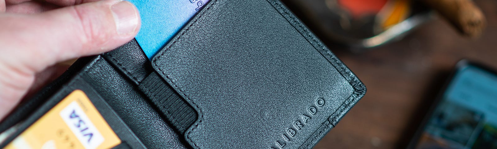Image of credit cards inside of a wallet.