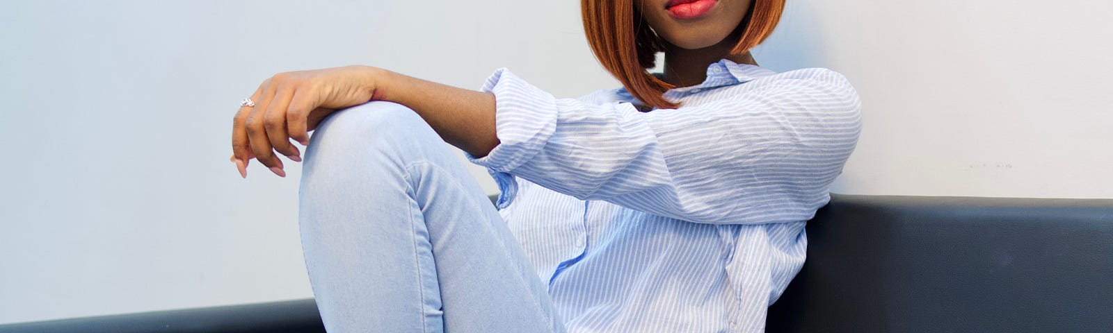 An elegant black lady with a laptop