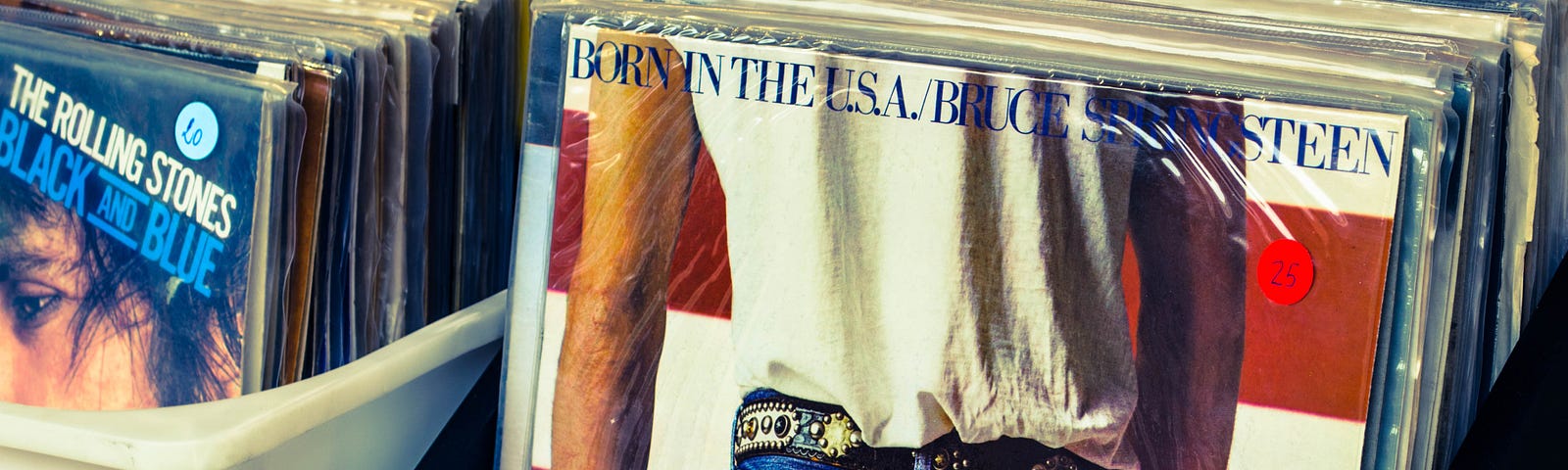 Picture of a Bruce Springsteen “Born in the U.S.A.” LP record in a record bin.