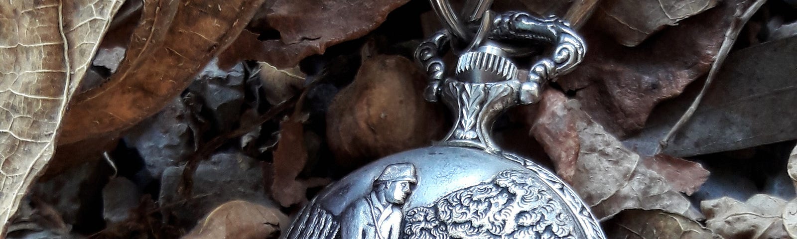 Locket in a bunch of decaying leaves