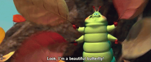 Animated GIF of caterpillar from A Bug’s Life flapping leaves as wings and exclaiming, “Look, I’m a beautiful butterfly!”