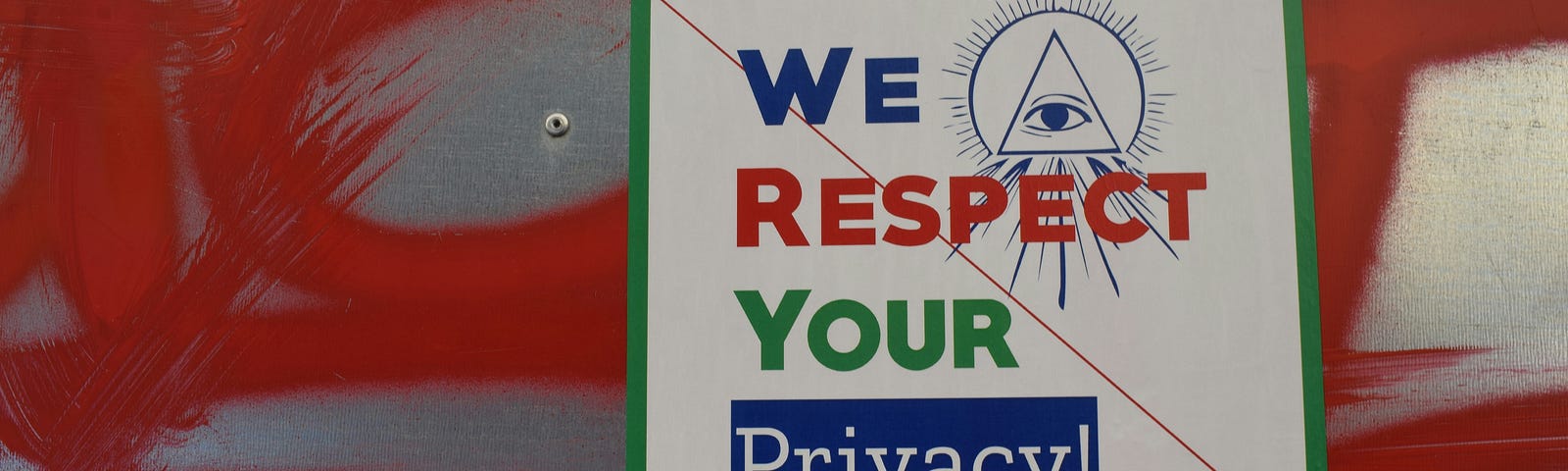We respect your privacy sign over red graffiti.