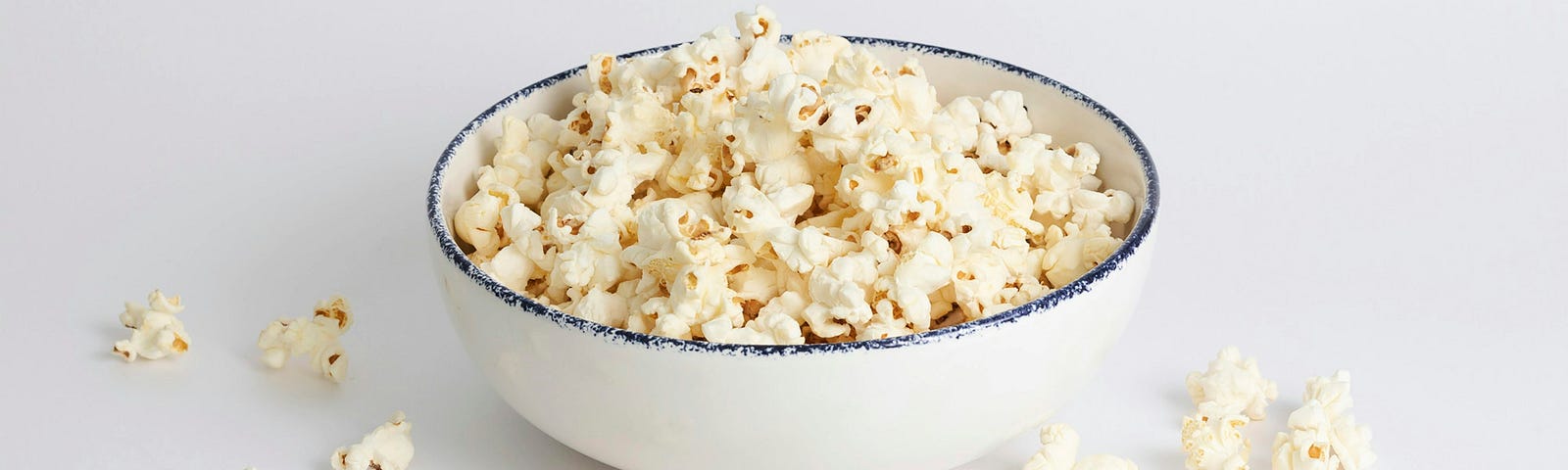 A bowl of popcorn. This food is permitted on a low FODMAP ddiet.