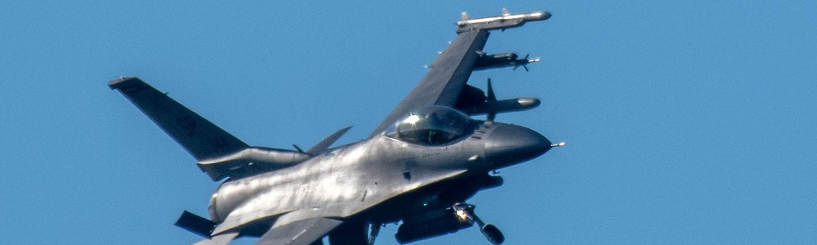 An F-16 Fighting Falcon fighter aircraft has its landing gear extended to land at the U.S. military airfield at Spangdahlem, Germany, May 17, 2023. Photo by Harald Tittel/dpa via Reuters Connect