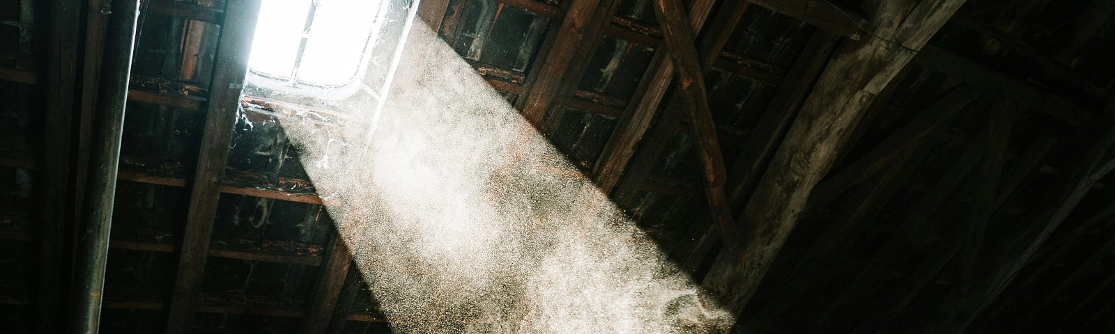 Dust illuminated by sunlight in an attic.