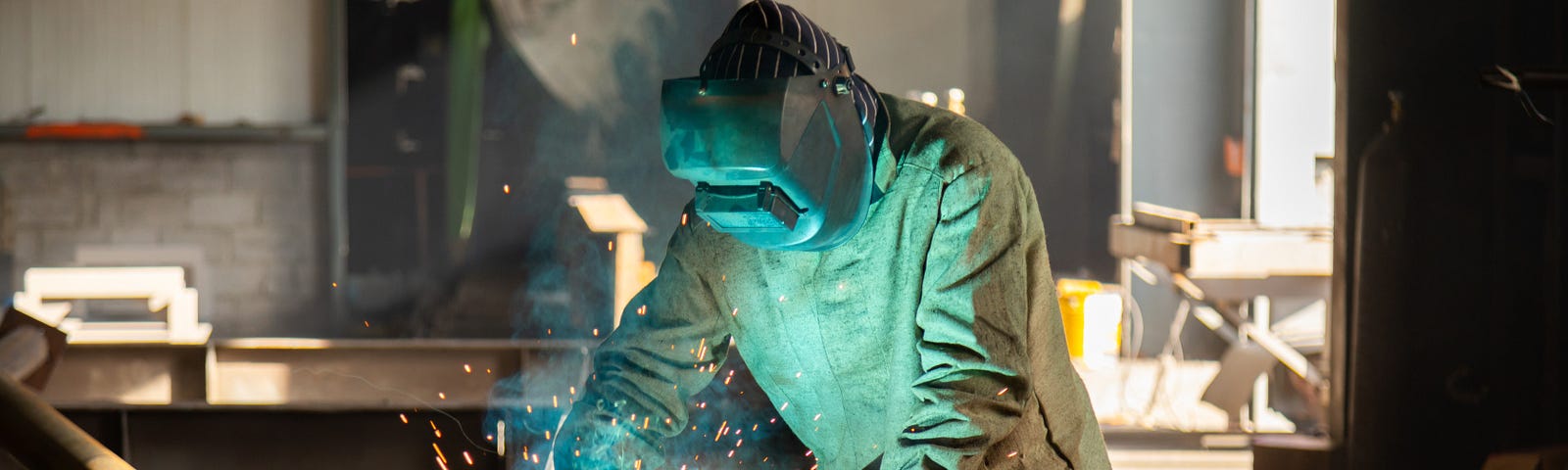 pic of a manufacturing business employee — a welder doing his work