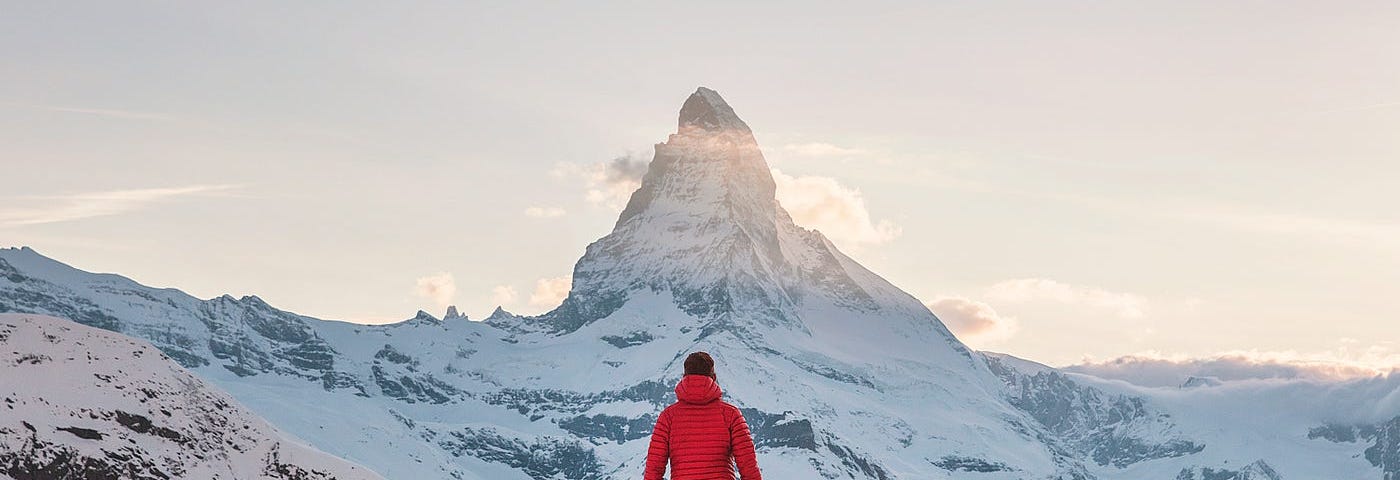 Man staring at Matterhorn from a distance