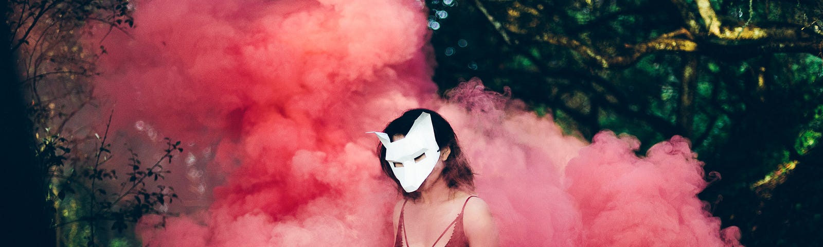 girl in red smoke with mask on