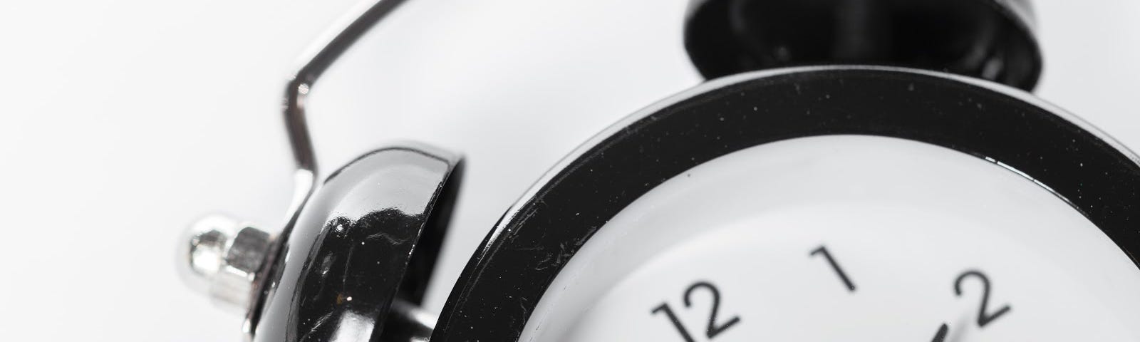 black and white classic style alarm clock with 2 bells